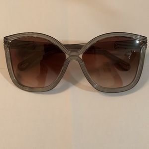 Sunglasses by Chloe. Grey strip.